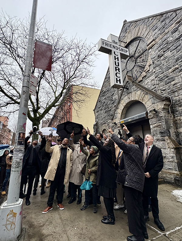 photo of historic district marker and signage reading 'The Friendship Church'