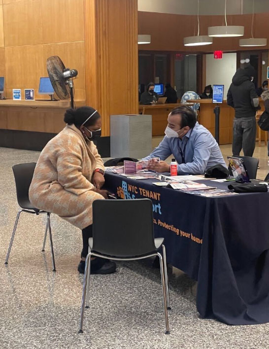 A woman is consulting with a P E U specialist about rent freeze
