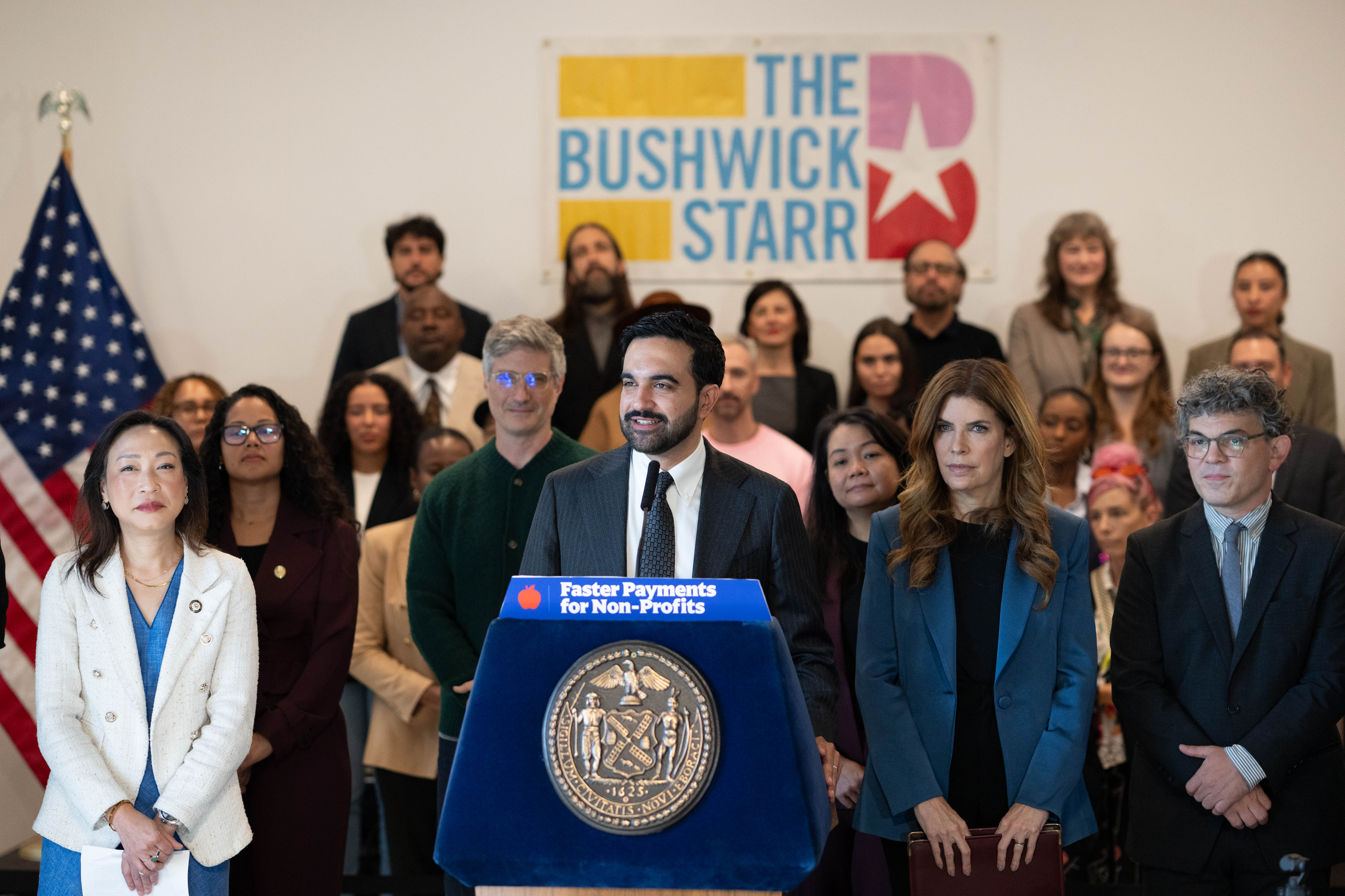 Mayor Mamdani standing with Speaker Menin, Administration and Grantees to Announce the Expansion of the Discretionary Grant Pilot Program.
                                           