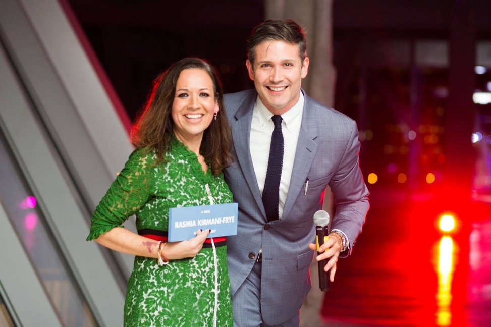 Residents and partners cheering at the newly built playground in Queens
