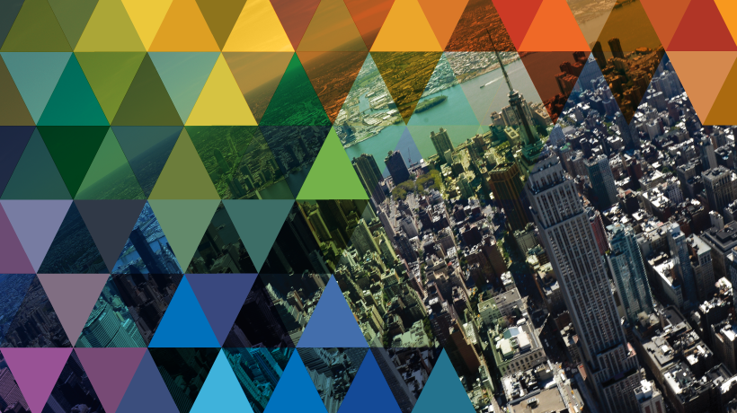 Colorful mosaic of triangles overlaying the NYC skyline including Empire State Buidling
