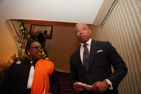 Mayor Eric Adams and Commissioner Noel standing in front of stairwell at Gracie Mansion.