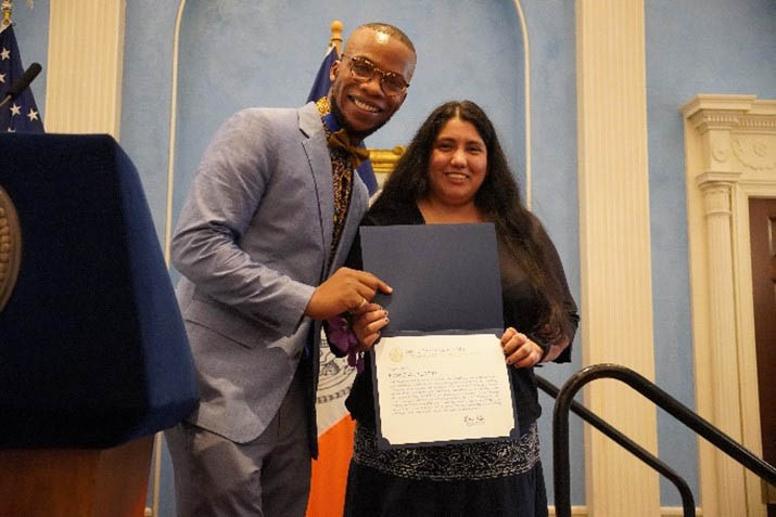 A person holding and awarding another person holding a certificate