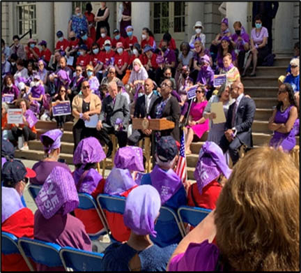 A crowd sitting outdoors for announcement of  the expansion of city elder abuse services at City Hall on World Elder Abuse Awareness Day. With Mayor Eric Adams, Department for the Aging, Comm. Lorraine Cortés-Vázquez in June 2022.