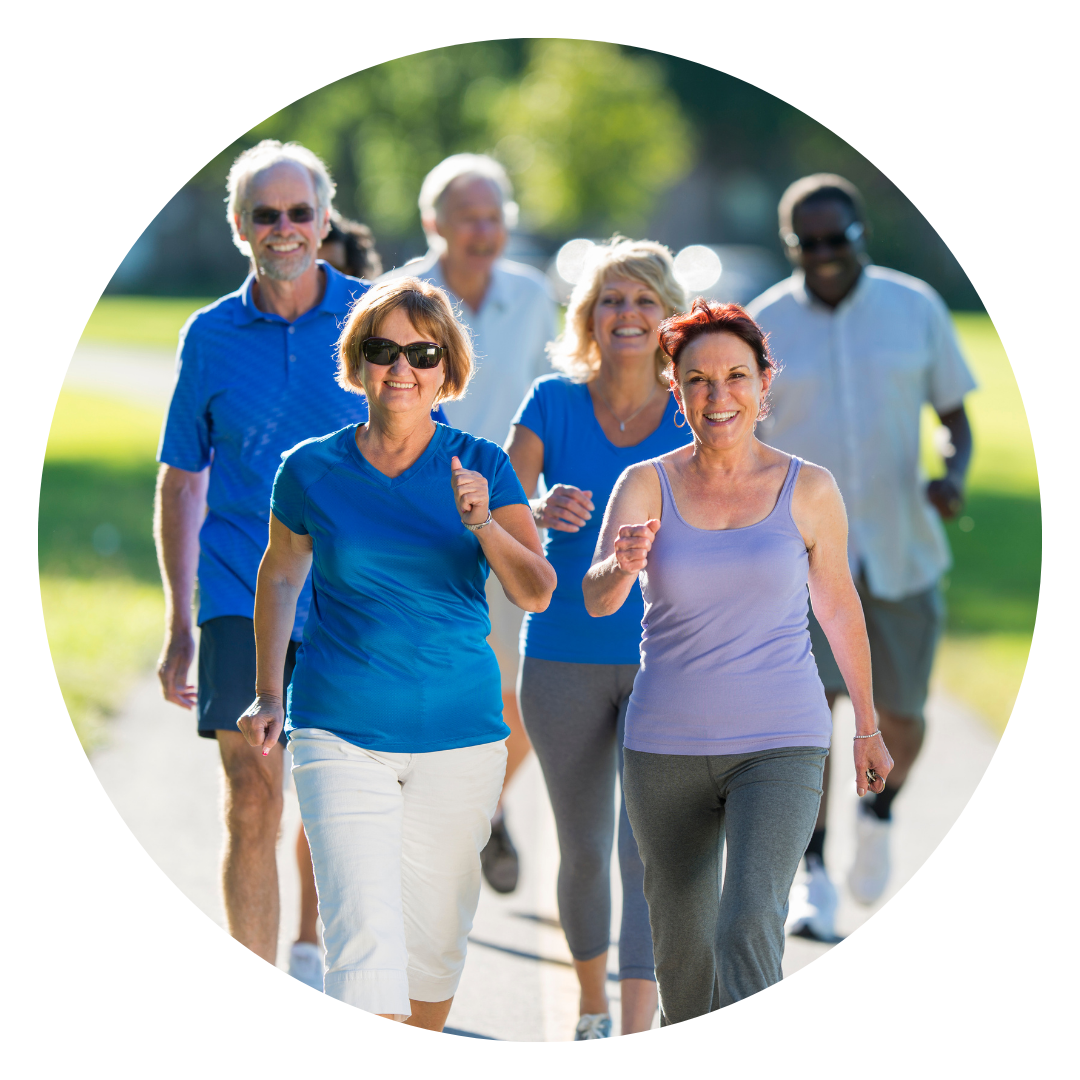Group of smiling people speed walking outdoors