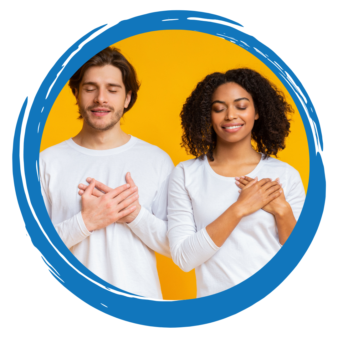 Two people with their hands over their hearts
