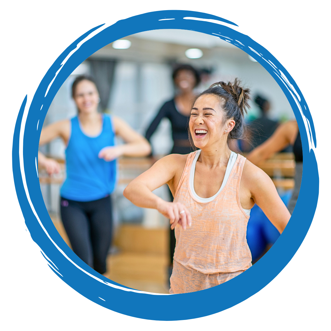 Smiling people in a fitness class