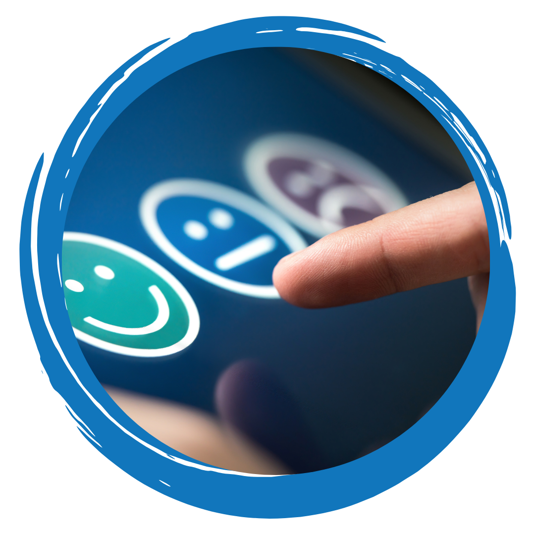 Photo of finger pointing to emoji