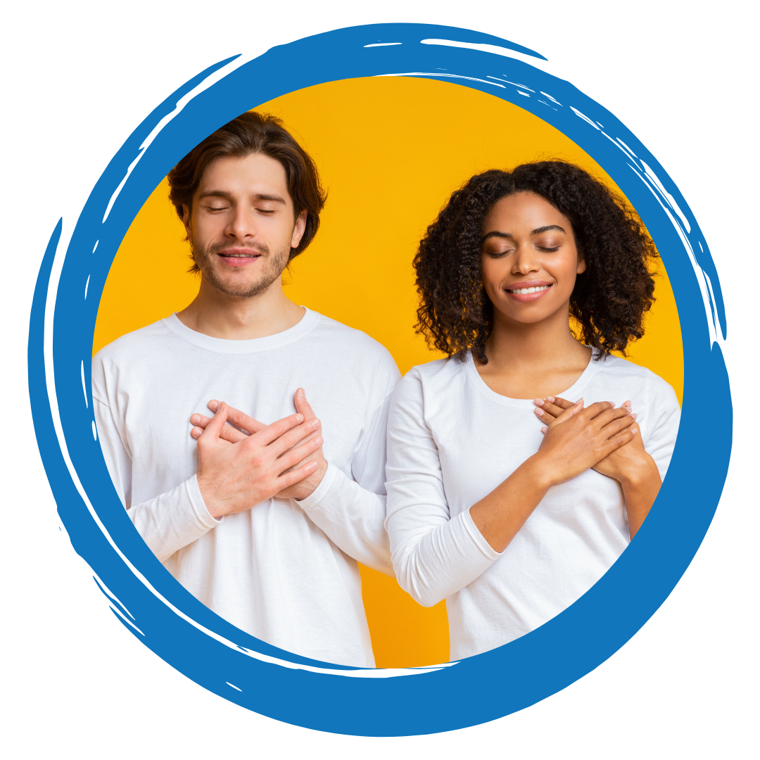 Two people with their hands over their hearts