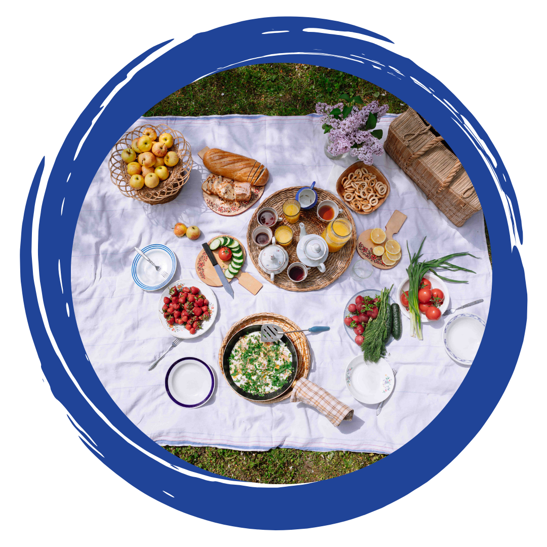 Food laid out on a blanket
