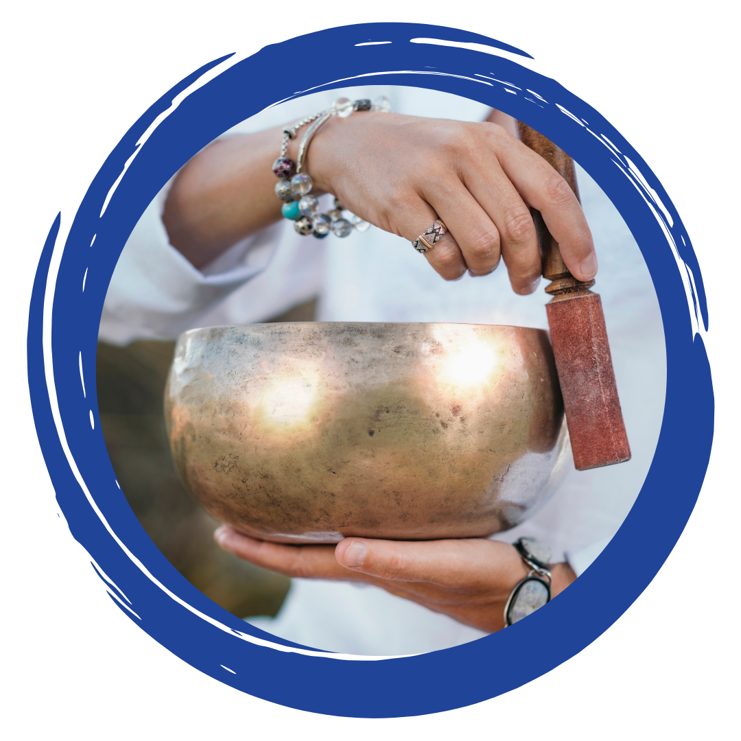Hands holding a brass bowl