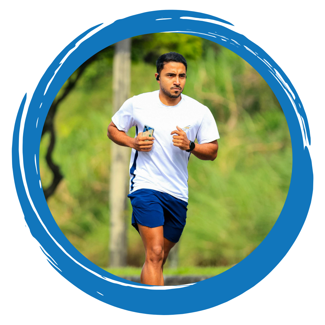 A Person jogging with greenery behind them