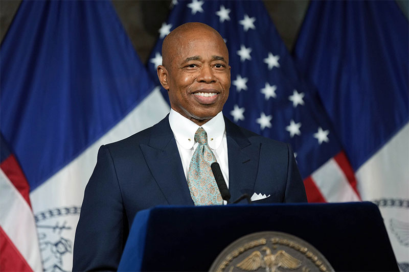 Statue of Liberty and Mayor Eric Adams
                                           