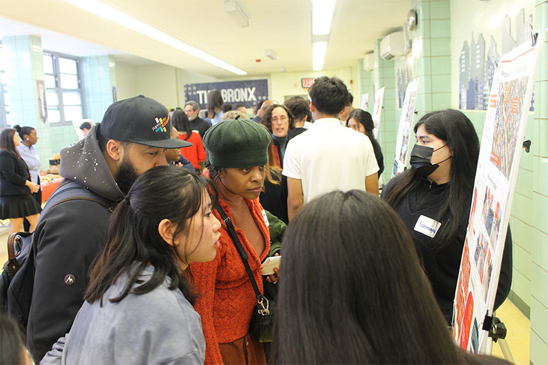 At The Laboratory School of Finance and Technology in the Bronx, seniors discussed their final projects with guests who attended the closing ceremony of this year’s youth engagement curriculum course by the Department of City Planning.