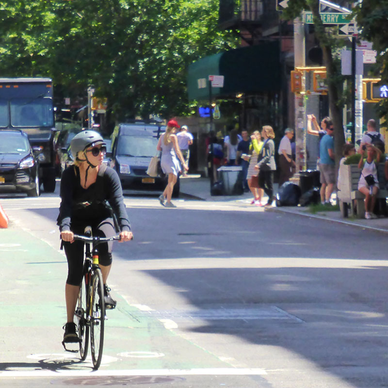 Person cycling in a bike lane