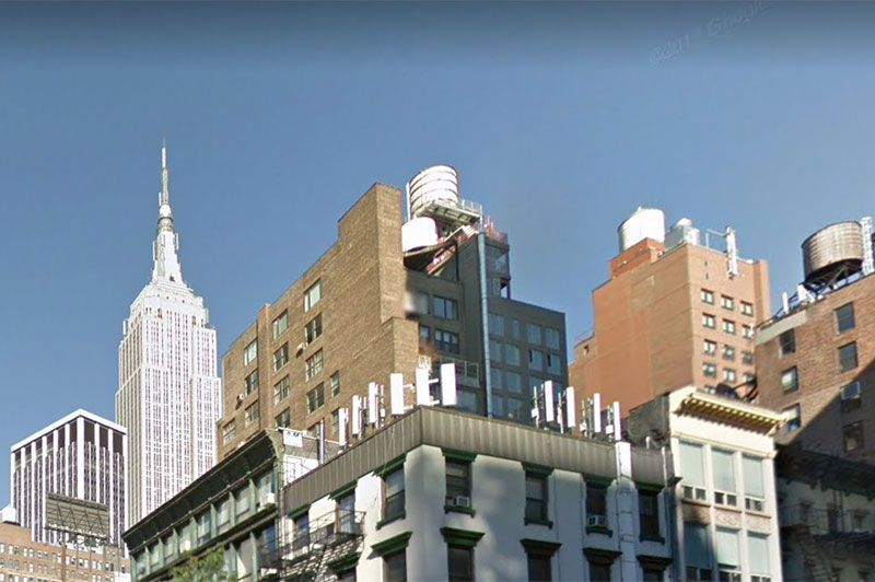 Tops of buildings with the Empire State Building in the background