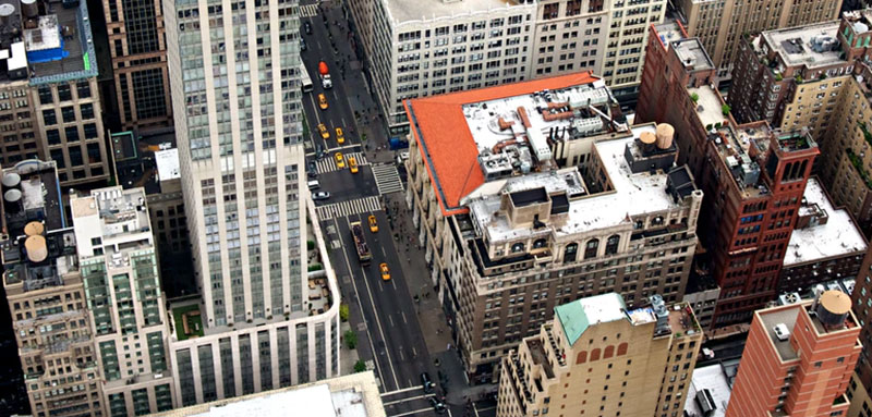 Three storefronts: a jOffice building rooftop
