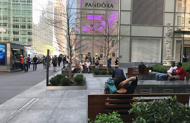 Seating provided within the sidewalk frontage of a public plaza