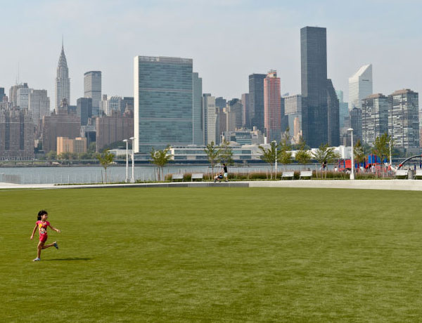Child playing in Hunter's Point South Park
                                           
