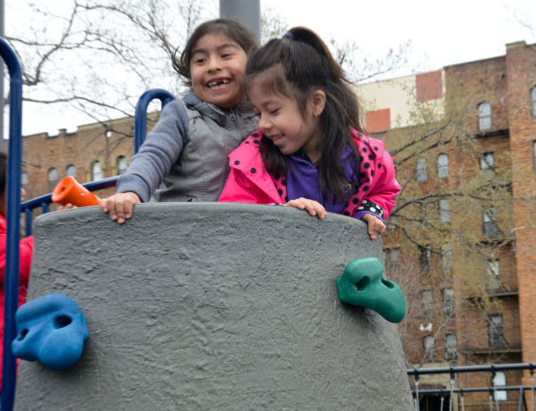 Children playing in Thomas P. Noonan Jr. Playground
                                           