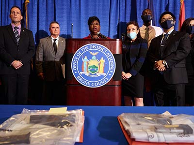 Photo of the Bronx DA at a press conference