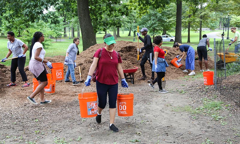 City Cleanup Corps Volunteers Cleaning Up Park