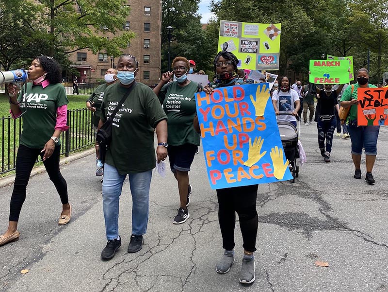 Rally of People holding signs for Safety