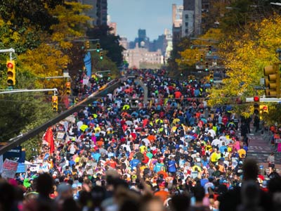 Photo of a crowd of people on a street