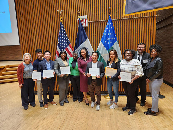 Group of N Y C BEST staff standing with S B S Commissioner Dynishal Gross at the Customer Service Awards Ceremony
                                           