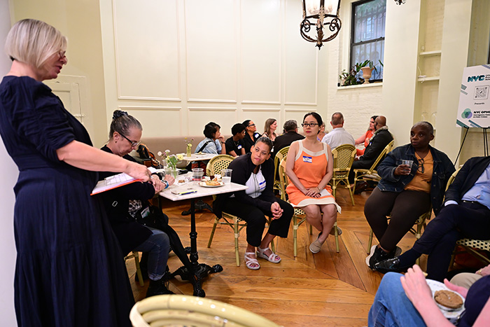 Group discussion at BBBB event, with diverse members sitting in a circle.