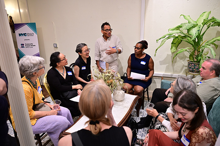 Group discussion at BBBB event, with diverse members.