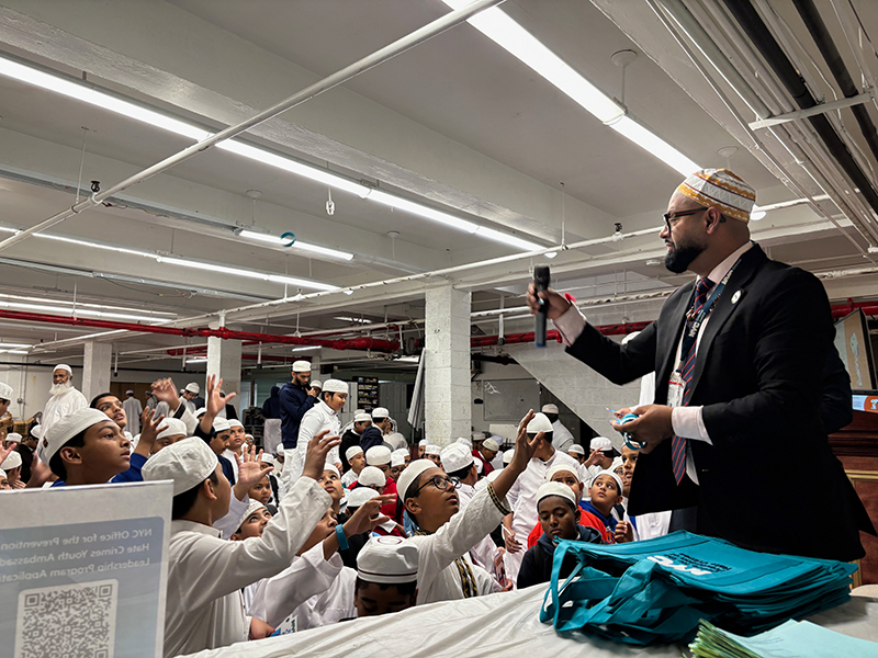 OPHC Executive Director Vijah Ramjattan speaks with students in Imam training school in Queens