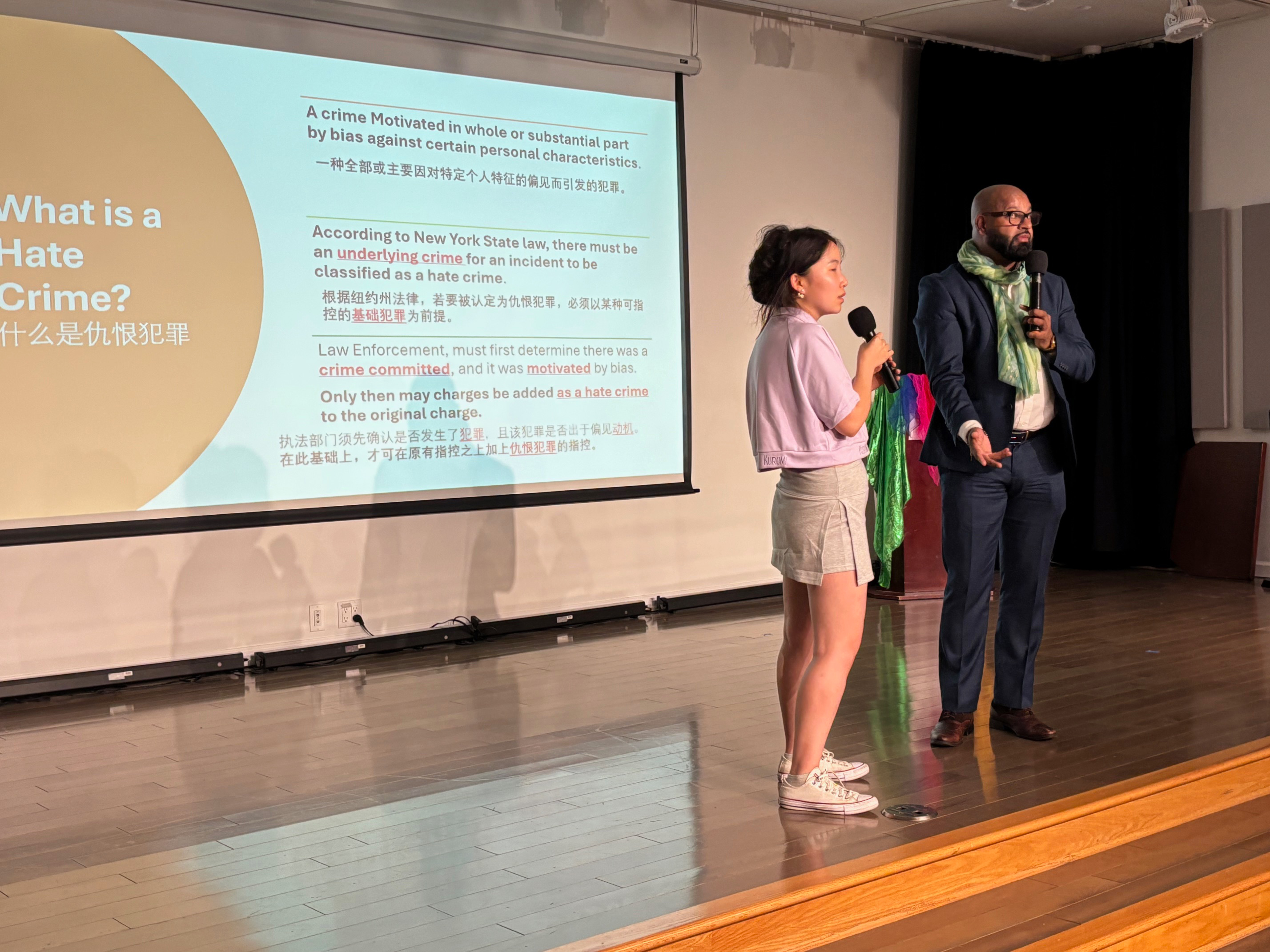 A youth was invited to stage to interact in discussing about Hate Crimes