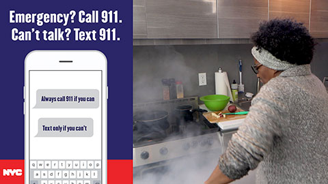 Photo of women in kitchen with smoke. Emergency? Call 911. Can't talk? Text 911.