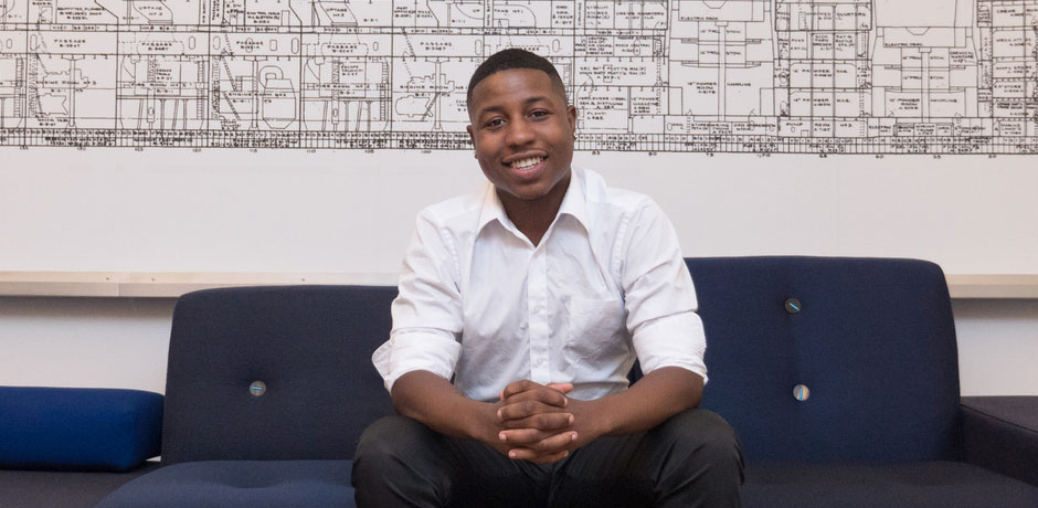 Photo of Young Man Sitting on a Sofa
                                           