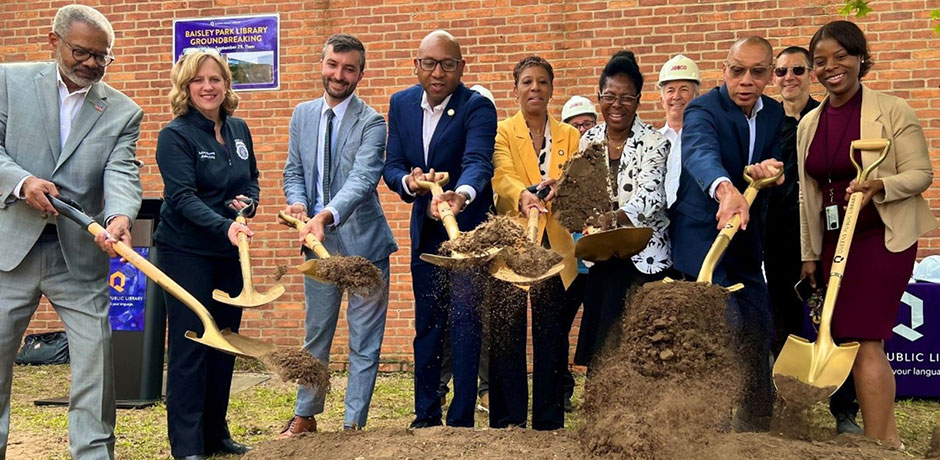 City officials shoveling dirt to celebrate groundbreaking
                                           