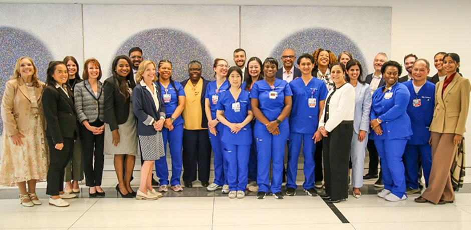 Nurses, staff and City officials standing together in celebration
                                           