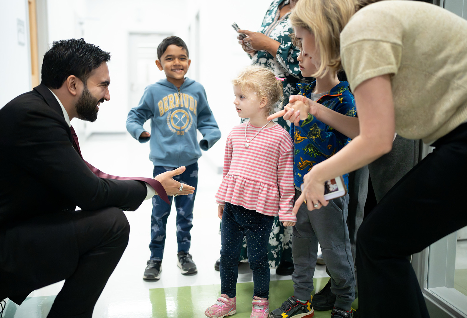 Mayor Zohran Kwame Mamdani interacting with children at the announcement of opening of early childhood education centers 
