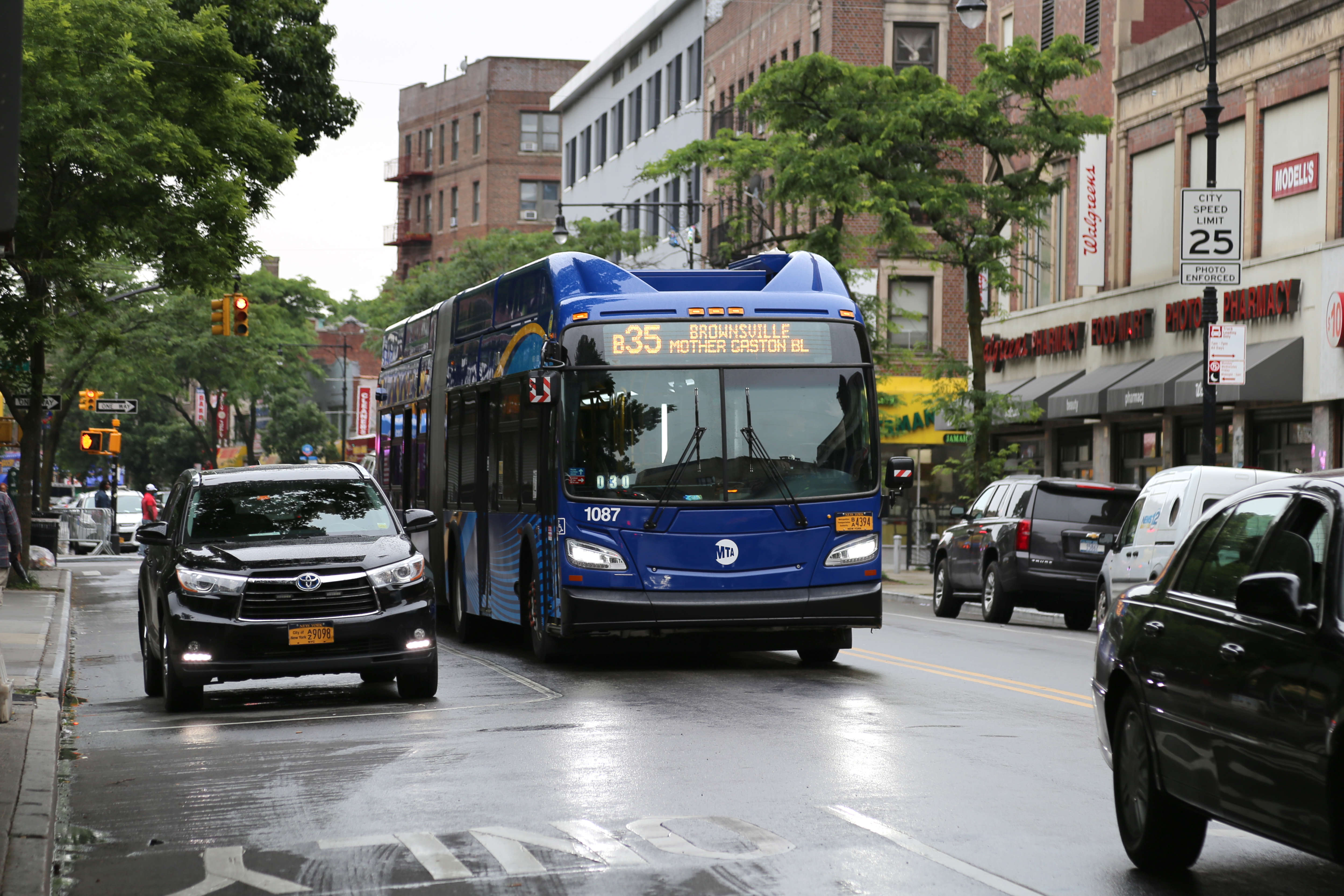 Blue MTA bus travels along Church Avenue in Central Brooklyn