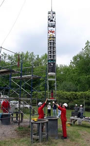 The vehicle is positioned over the shaft.