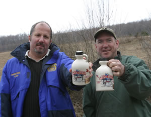 Commissioner Ward joins Sean Farnum in showing off the final product, quarts of 100% pure maple syrup. Mr. Farnum and his father Cliff have 1,200 taps spread over five acres of DEP land. New York State is the second largest producer of pure maple products in the country, trailing only Vermont.