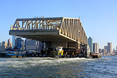 Willis Avenue Bridge being towed up the East River - image 6