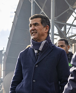 Commissioner Rodriguez stands outside at the NYC DOT asphalt plant on a winter’s day