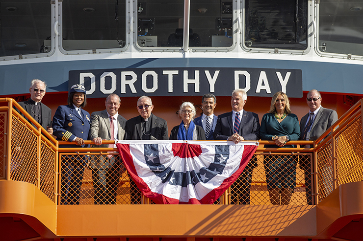 PPeople gather on the deck of a new ferry named Dorothy Day.