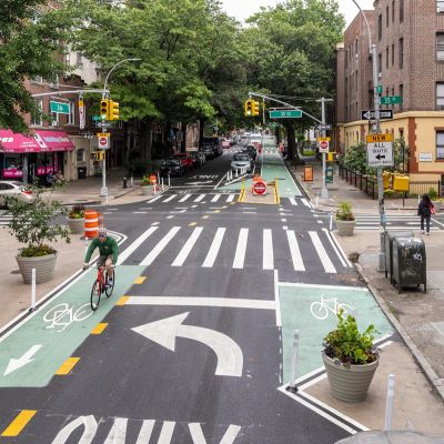 Redesigned portion of 31st Avenue in Queens includes green bike lanes and expanded pedestrian space.