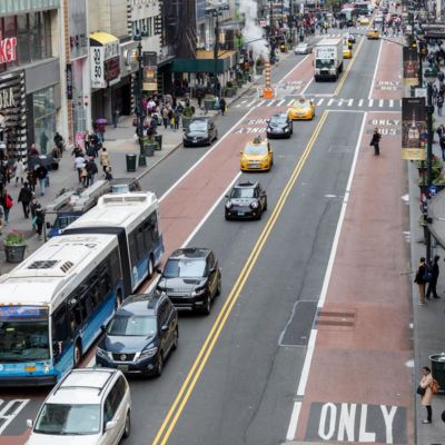34th Street’s current configuration features two red bus lanes, one next to the curb and another offset from the curb.