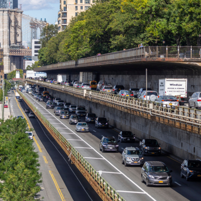 Cars and trucks drive along the triple cantilever section of the Brooklyn-Queens Expressway.