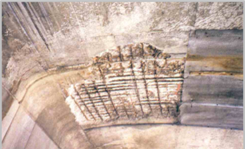 Photo of exposed steel rods in the triple cantilever structure.