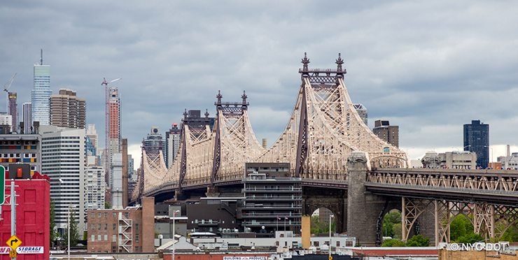 The Ed Koch Queensboro Bridge expands over the East River from Queens to Manhattan