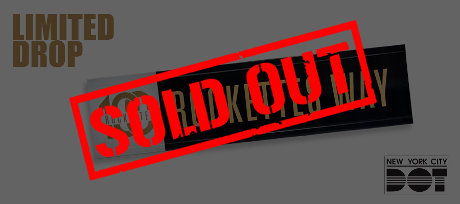 Red overlay text reads Sold Out over black, white, and gold sign of Rockettes Way.